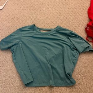 Fabletics Eco-Conscious Twist Back Tee. Size xs. Great condition. Blue.